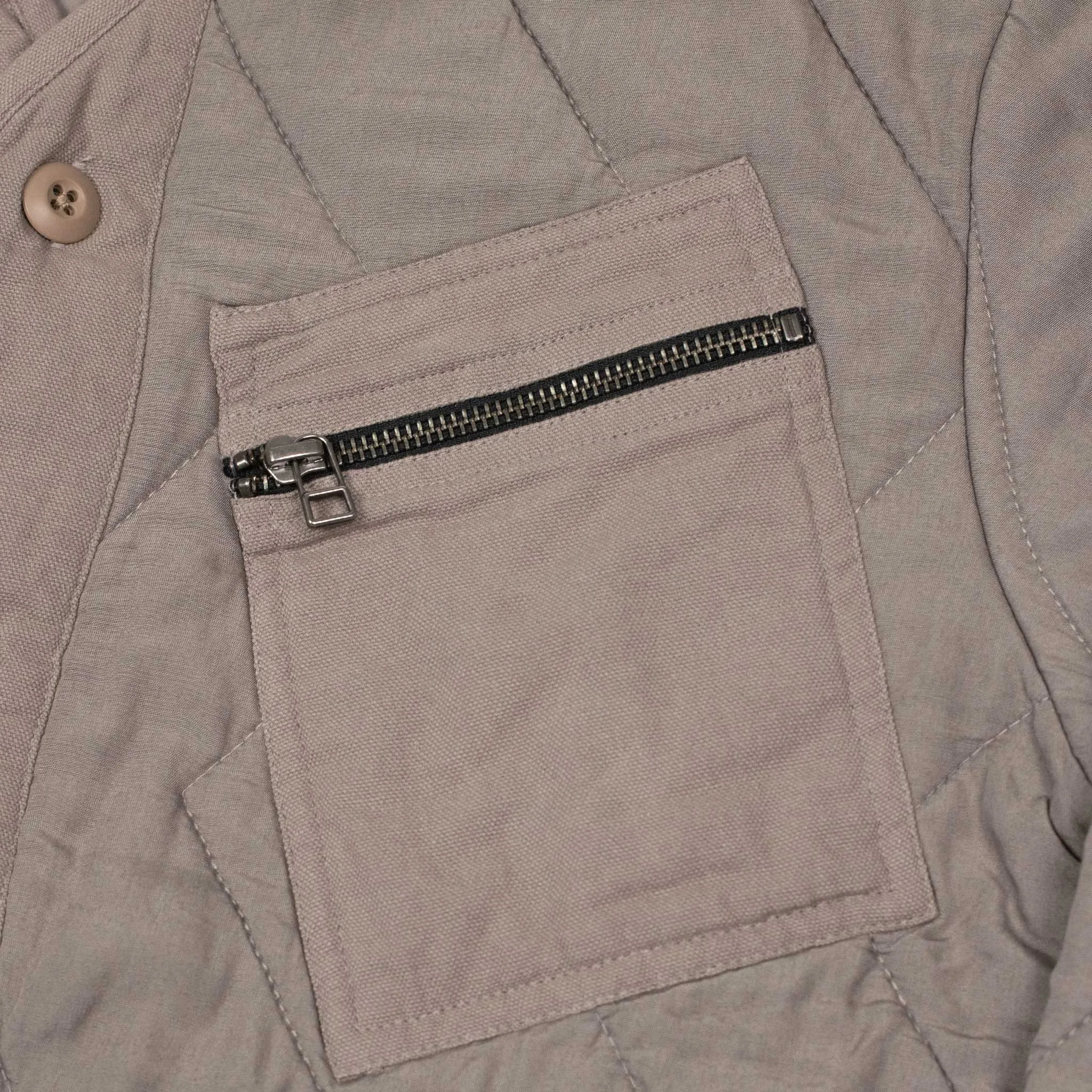Liner jacket in steel grey zig zag quilted tencel